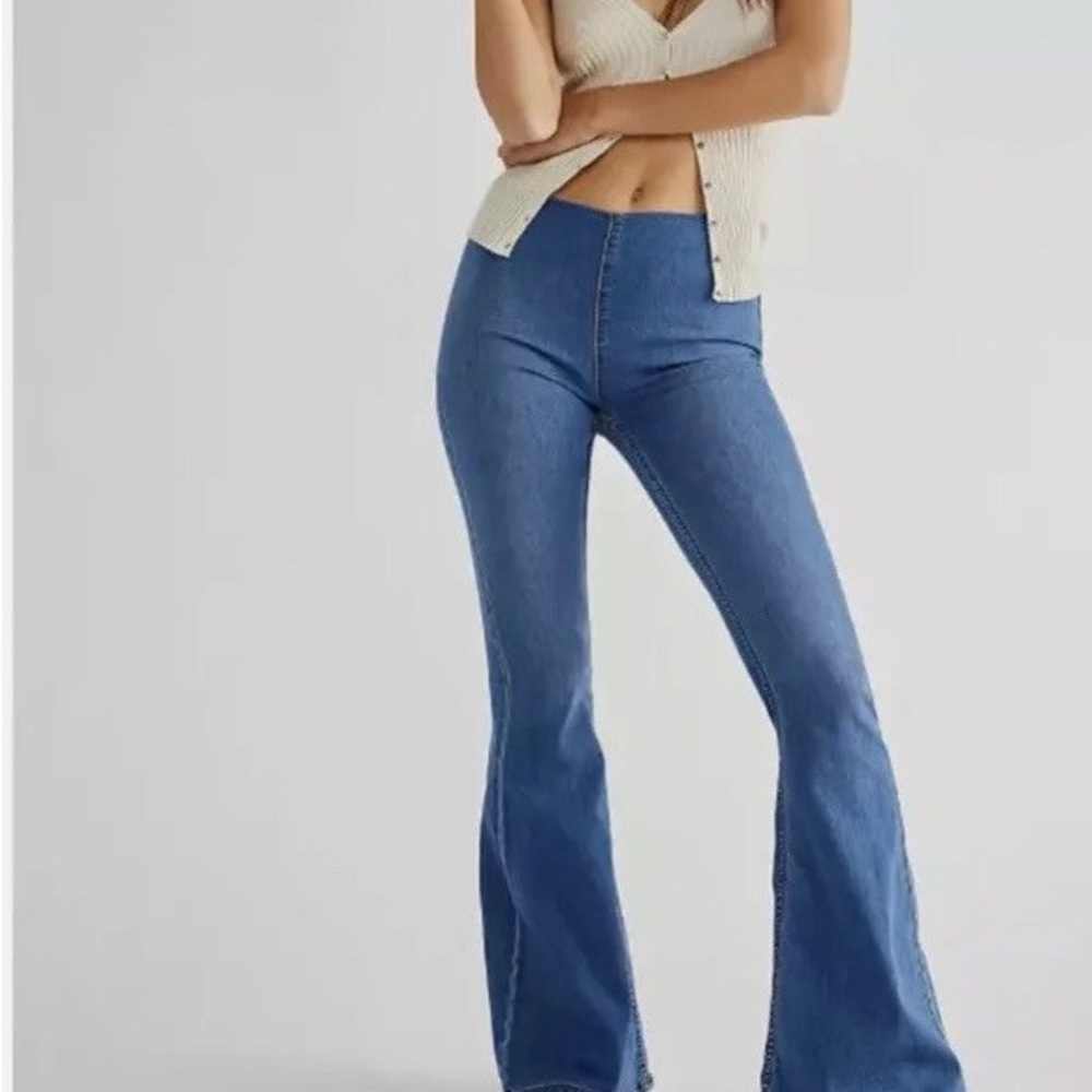Free people Women's pull on Blue Flared Jeans size 29 bootcut raw hem western